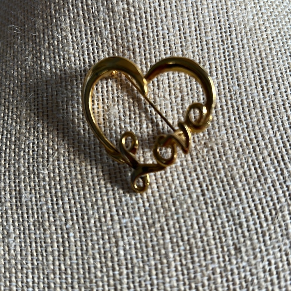 Vintage unmarked “love” heart brooch